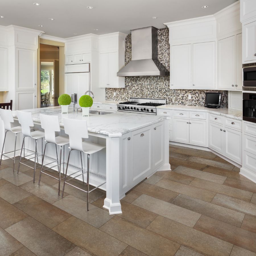 tile backsplash in kitchen with cabinets